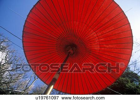 A red Japanese umbrella View Large Photo Image Stock Photo - A red Japanese umbrella. Fotosearch