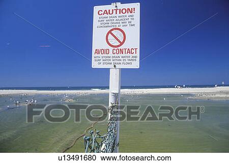 A sign that reads “Caution - Avoid Contact” View Large Photo Image Stock Image - A sign that reads “Caution - Avoid Contact”. Fotosearch