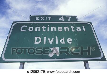 A sign that reads “Continental Divide” View Large Photo Image Stock Photo - A sign that reads “Continental Divide”. Fotosearch