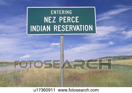 Stock Image - A sign that reads “Entering Nez Perce Indian Reservation”. Fotosearch