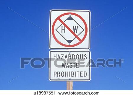 Stock Image - A sign that reads “Hazardous waste prohibited”. Fotosearch