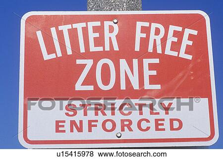 Stock Photo - A sign that reads “Litter Free Zone Strictly Enforced”. Fotosearch
