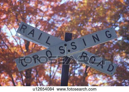 A sign that reads “Railroad crossing” View Large Photo Image Picture - A sign that reads “Railroad crossing”. Fotosearch