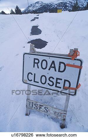 A sign that reads “Road Closed” View Large Photo Image Stock Photograph - A sign that reads “Road Closed”. Fotosearch