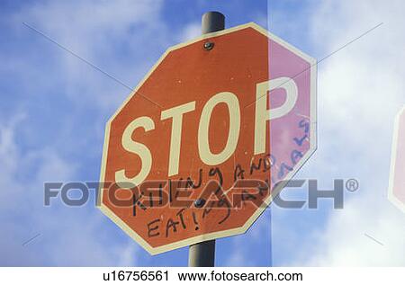 Stock Image - A sign that reads “Stop killing and eating animals”. Fotosearch