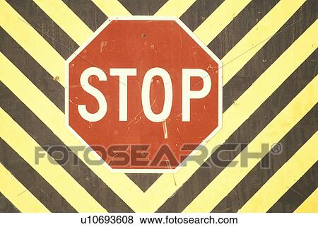 Stock Photo - A sign that reads “Stop”. Fotosearch
