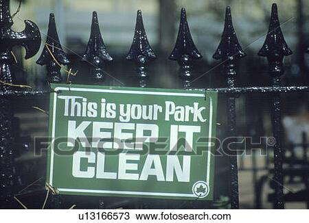 Stock Image - A sign that reads “This is your park - Keep it clean”. Fotosearch