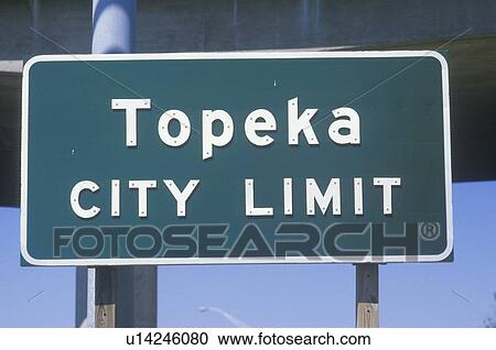 Stock Image - A sign that reads “Topeka city limit”. Fotosearch