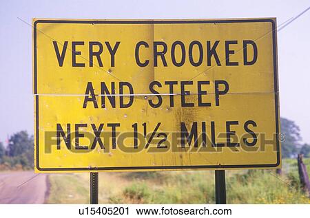 A sign that reads “Very crooked and steep next 1 1/2 miles” View Large Photo Image Stock Image - A sign that reads “Very crooked and steep next 1 1/2 miles”. Fotosearch