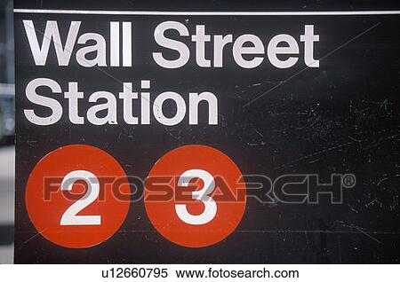 Stock Photography - A sign that reads “Wall Street Station”. Fotosearch