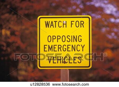 A sign that reads “Watch for opposing emergency vehicles” View Large Photo Image Stock Photograph - A sign that reads “Watch for opposing emergency vehicles”. Fotosearch