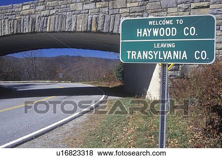 A sign that reads “Welcome to Haywood Co.; Leaving Transylvania Co. ” View Large Photo Image Stock Photo - A sign that reads “Welcome to Haywood Co.; Leaving Transylvania Co. ”. Fotosearch