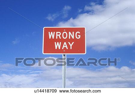A sign that reads “Wrong Way” View Large Photo Image Stock Photo - A sign that reads “Wrong Way”. Fotosearch