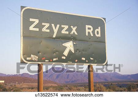 Picture - A sign that reads “Zzyzx Rd”. Fotosearch