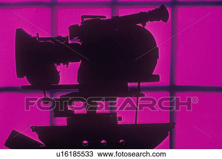Stock Image - A sillouhetted television camera, Hollywood, CA. Fotosearch