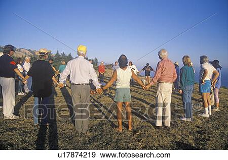 Stock Photo - A sunset ceremony for an earth new age gathering. Fotosearch