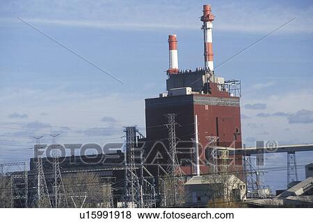 Stock Photo - A vertical image of a utility plant. Fotosearch