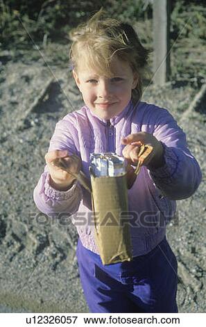 A young girl selling chocolate bars View Large Photo Image Stock Photo - A young girl selling chocolate bars. Fotosearch