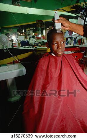 African American boy in barber's chair View Large Photo Image Stock Photo - African American boy in barber's chair. Fotosearch