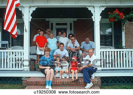 American family on front porch View Large Photo Image Stock Photo - American family on front porch. Fotosearch