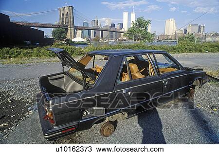 Stock Image - An abandoned, stripped automobile. Fotosearch