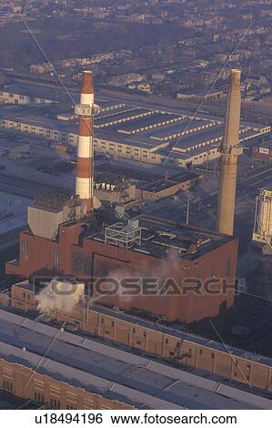 Stock Photograph - An aerial view of an industrial smoke stack. Fotosearch