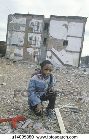 Stock Image - An African-American boy in the ghetto, South Bronx, NY. Fotosearch