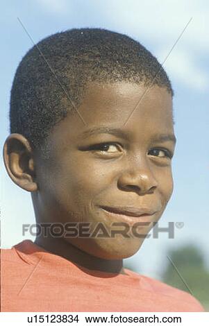 Picture - An African-American boy. Fotosearch