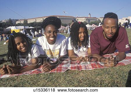 An African-American family picnicing View Large Photo Image Stock Photo - An African-American family picnicing. Fotosearch