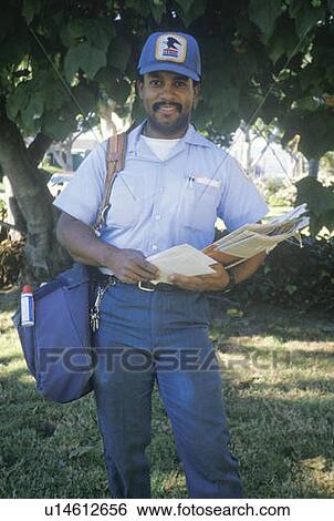 An African-American mail carrier on his route View Large Photo Image Stock Photograph - An African-American mail carrier on his route. Fotosearch