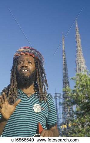 Stock Image - An African-American man wearing dreadlocks. Fotosearch