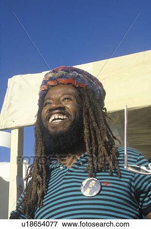 Stock Photo - An African-American man wearing dreadlocks. Fotosearch