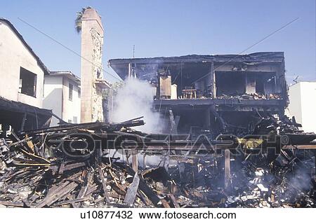 An apartment building on fire as a result of earthquake View Large Photo Image Stock Image - An apartment building on fire as a result of earthquake. Fotosearch