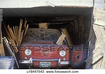 An old red car in a Colorado garage View Large Photo Image Stock Image - An old red car in a Colorado garage. Fotosearch