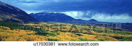 Stock Image - Autumn clouds at Kebler Pass, Gunnison National Forest, Colorado. Fotosearch