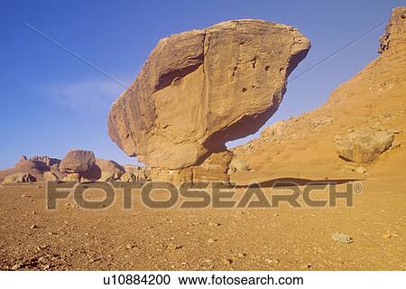 Balanced rock at sunrise near Lees Ferry, Vermillion Cliffs in Marble Canyon, Arizona View Large Photo Image Stock Image - Balanced rock at sunrise near Lees Ferry, Vermillion Cliffs in Marble Canyon, Arizona. Fotosearch