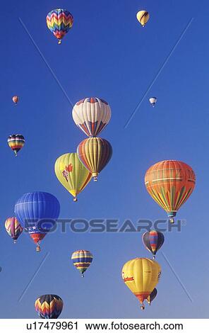 Balloons take to the air View Large Photo Image Stock Image - Balloons take to the air. Fotosearch