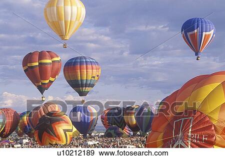 Balloons take to the air View Large Photo Image Stock Photo - Balloons take to the air. Fotosearch