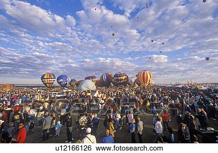 Balloons take to the air View Large Photo Image Stock Photograph - Balloons take to the air. Fotosearch