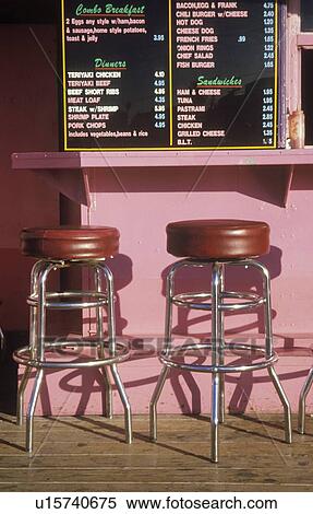 Bar stools at an outdoor hamburger stand View Large Photo Image Stock Photography - Bar stools at an outdoor hamburger stand. Fotosearch