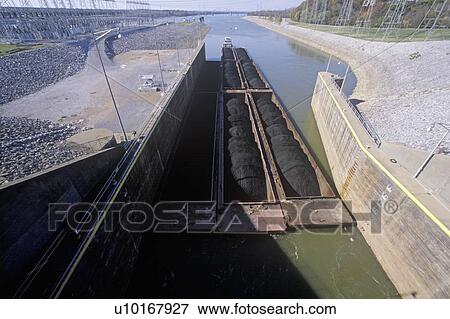 Stock Photo - Barge on the Kentucky Dam canal lock on the Tennessee River, TN. Fotosearch