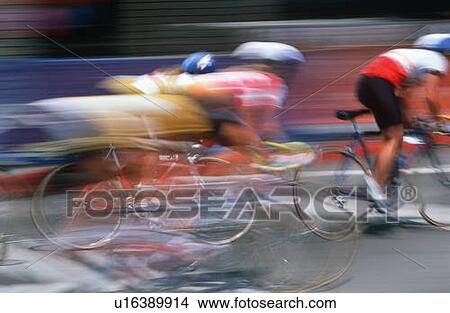 Bicycle racers speeding past View Large Photo Image Picture - Bicycle racers speeding past. Fotosearch