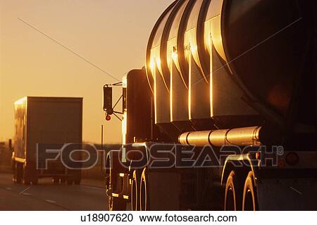 Big rig trucks on the highway View Large Photo Image Stock Image - Big rig trucks on the highway. Fotosearch