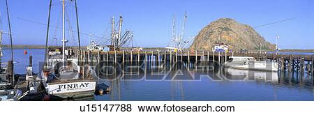 Stock Photo - Boat landing and Morro Rock at Morro Bay, California. Fotosearch