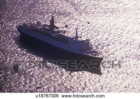 Boat sails into New York Harbor View Large Photo Image Stock Photograph - Boat sails into New York Harbor. Fotosearch