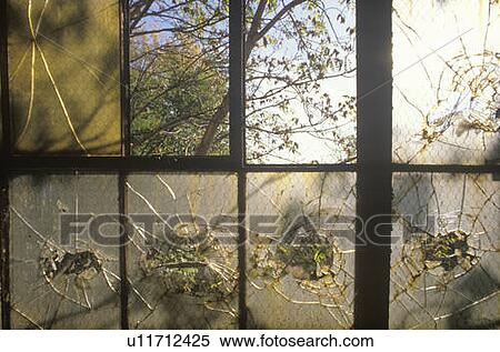 Broken windows in abandoned factory View Large Photo Image Stock Photography - Broken windows in abandoned factory. Fotosearch