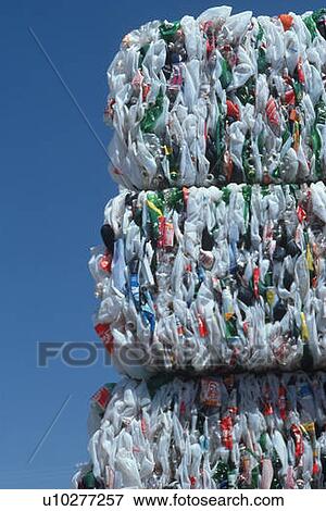 Stock Photo - Bundles of plastic at recycling plant. Fotosearch