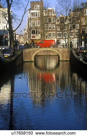 Stock Image - Canal in Amsterdam, Holland. Fotosearch