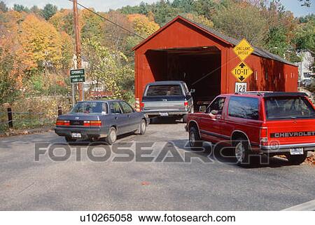 Stock Photo - Cars entering Covered Bridge. Fotosearch