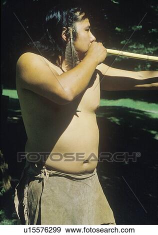 Stock Photo - Cherokee with blow gun. Fotosearch